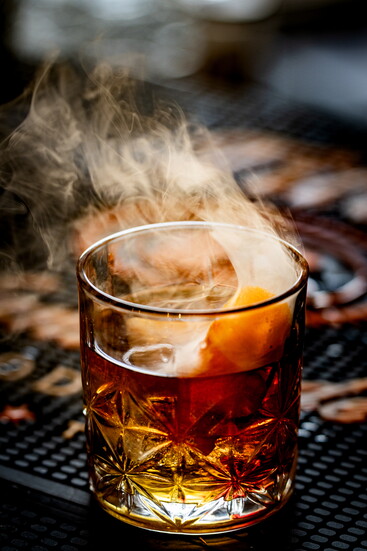The Perfect Old Fashioned, handcrafted right at The Hearth to elevate your downtown dining experience.