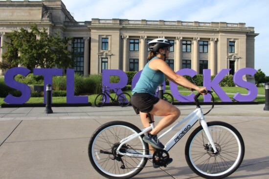 Carla Sauerwein believes St. Louis Rocks - especially on a Pedego Electric Bike