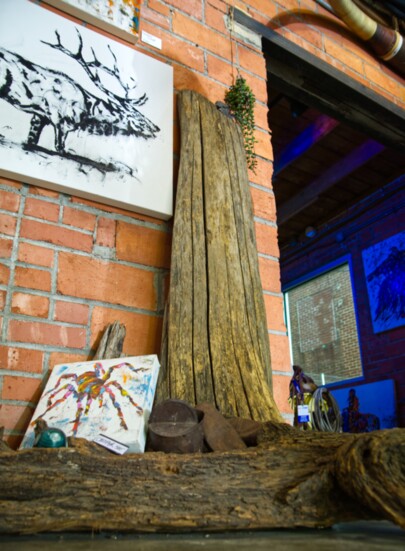 Josh Stout Gallery showcases natural elements alongside his artwork.