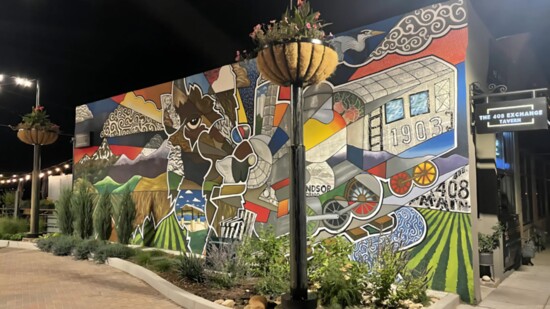 Windsorigins, by Fort Collins muralist Chris Bates, was the first mural to be completed by the Windsor Arts Commission and is located at 408 Main Street.