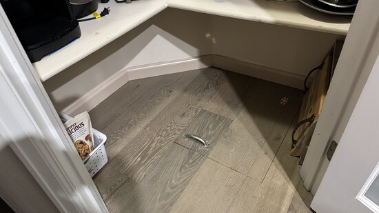 This simple floor panel, conceals valuable storage below.