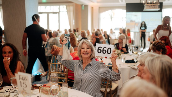 Attendees Participate in Silent & Live Auctions...