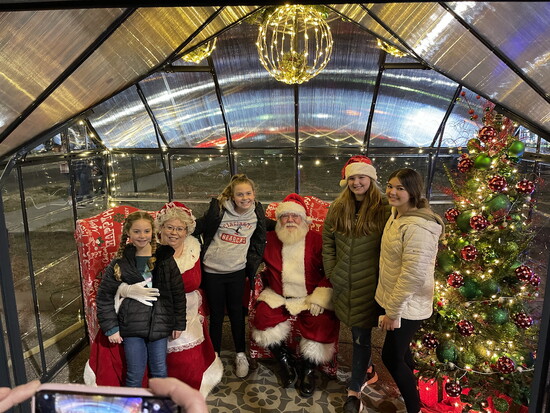 Capture pictures with Santa + Mrs. Claus.