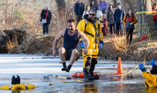 Residents jumped into the pond during the Polar Plunge.