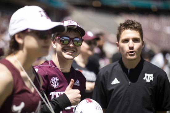 Parker attends a Texas A&M football game.