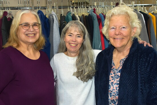 Founder Ronda Oliver in between two volunteers Bev and Gaylyn