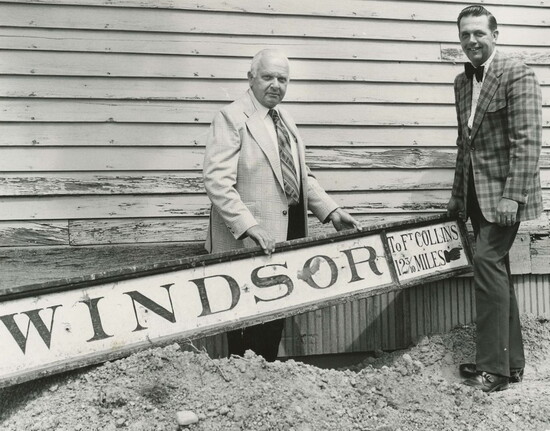 Bob Hogan and Howard Smith hold a sign from the original Depot during it’s move, July 24, 1975. The sign is now part of the Windsor Museum collection. 