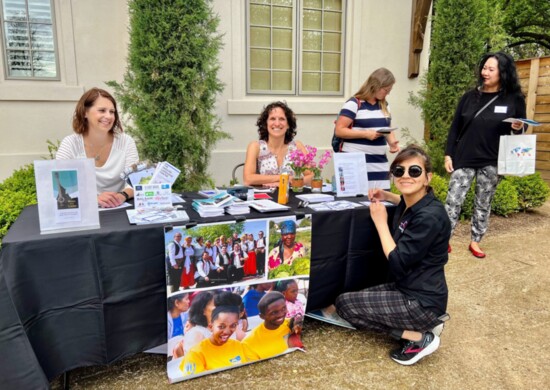 Idaho Office for Refugees and partners gather for the first ever Music for a Cause fundraiser in Boise on May 6, 2022. From left: Jannus Inc. Executive Director