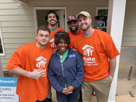 Big Dawg Moving company team members volunteered then helped move the homeowner into her new home