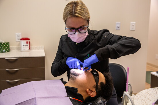 Dr Dr. Wingad with Patient