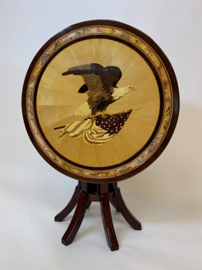 Eagle Tip Table project completed for a client whose father passed away before he could finish the inlaid eagle. All woods are their natural colors.