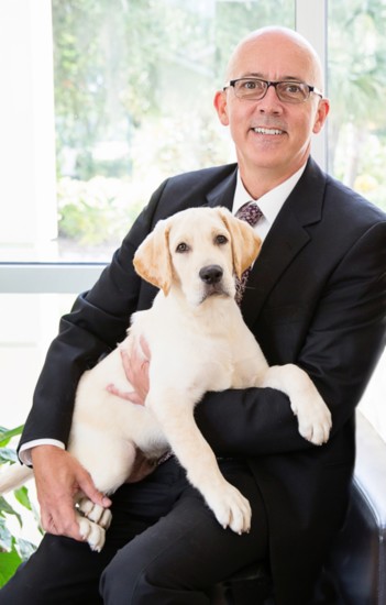 Titus Herman is the CEO of Southeastern Guide Dogs in Palmetto,  a national nonprofit that trains guide and service dogs.