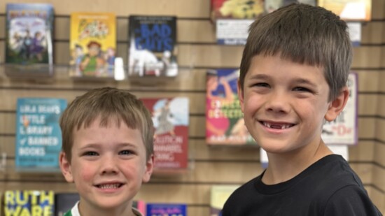 Siblings help promote the book of the month