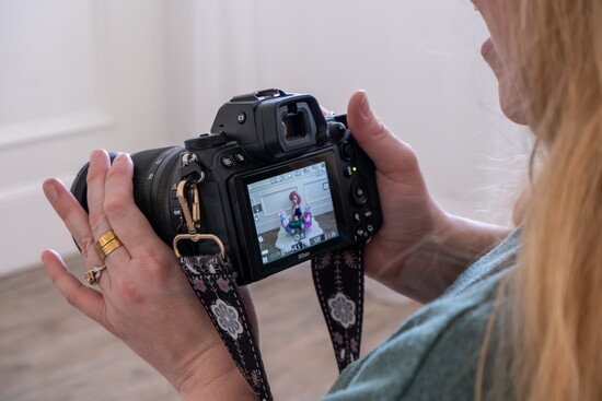 Jen photographing her daughter, Lily