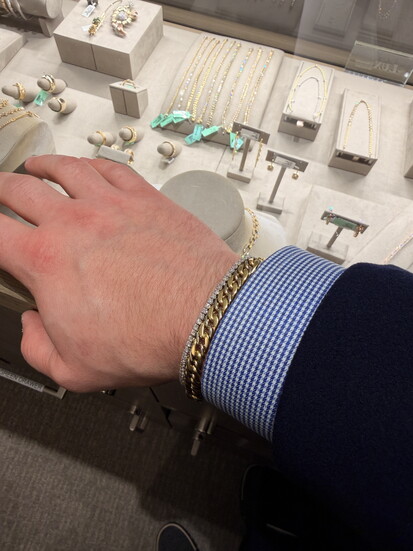 Charlie Green models a diamond line bracelet, his top pick for a 2026 investment piece.