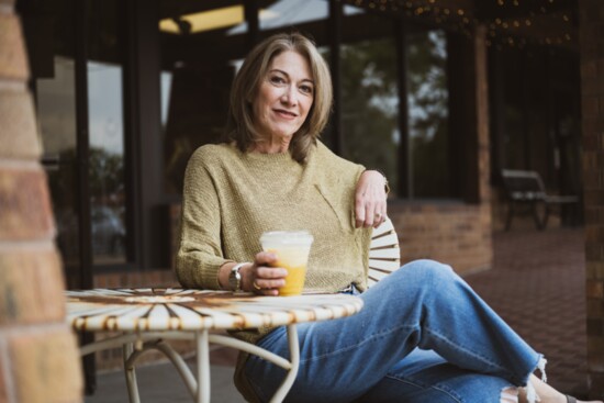 Beth Aksamitowski enjoying an iced libation from Charley & CO.'s coffee shop