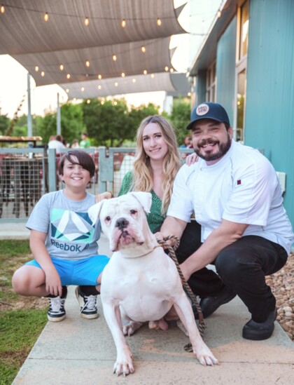 Owners Alex & Kelli Gianopoulos, son Elias and office dog, Bronx