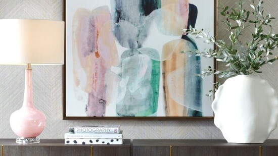 Artwork mounted above tables. Photo courtesy of Uttermost Co.
