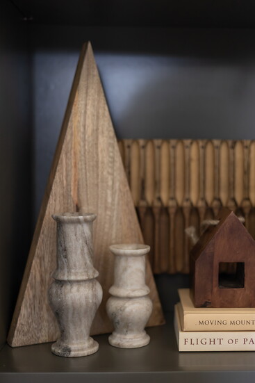 Unique items like these trees, bud vases, and cigar molds catch the attention and spark conversation.