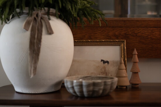 Touches of art—like this print and frame from Boerne Farmhouse—help tell your story.