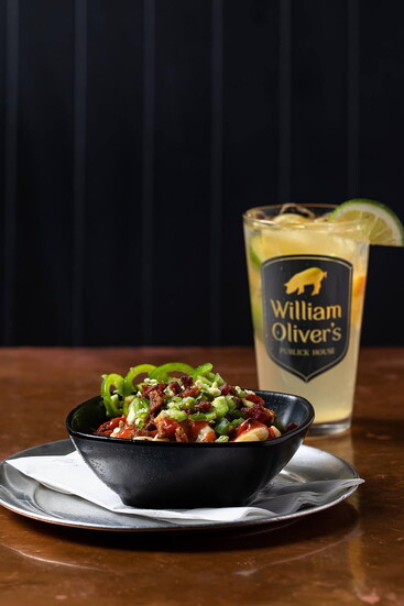 A bold, flavor-packed comfort bowl topped with jalapeños and bacon, William Oliver’s serves up food that is anything but ordinary.