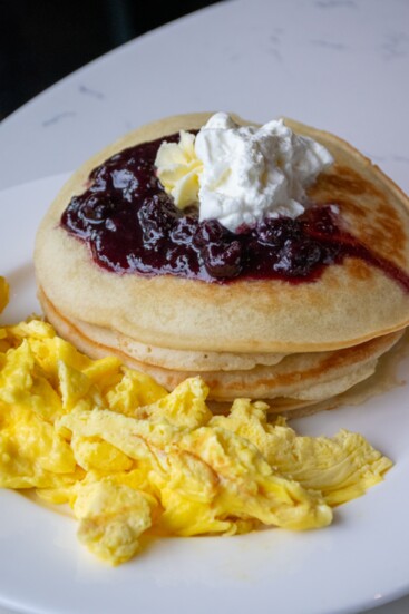 Drawing Room Pancakes with house berry compote and whipped cream