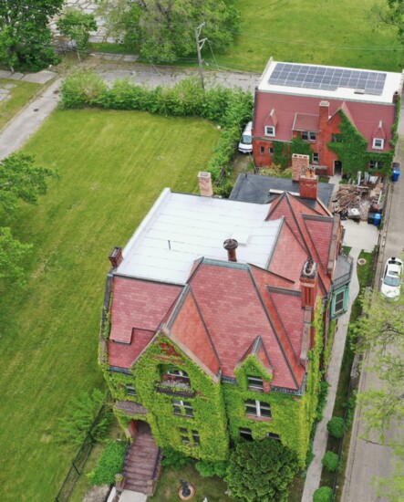 Estate-style home with solar flat roof..