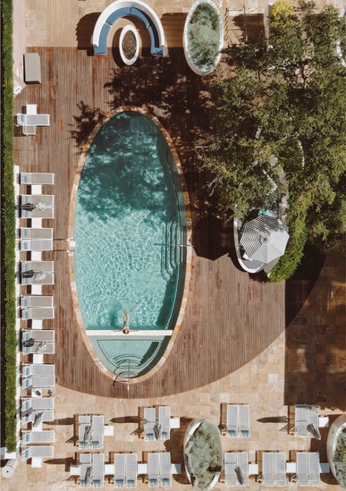 The fourth-floor pool deck is a welcomed oasis amid the city skycape.